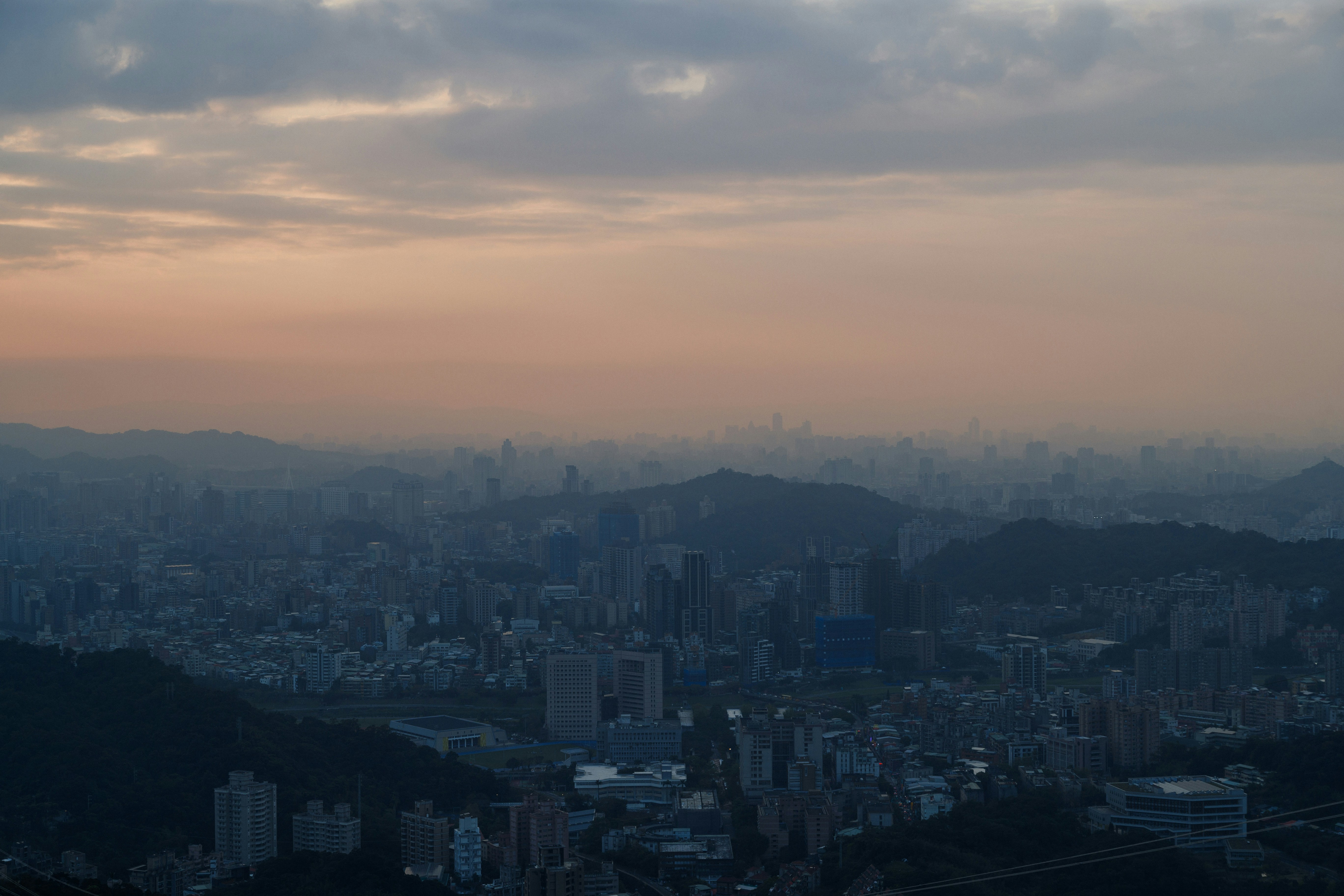 City with mountains background