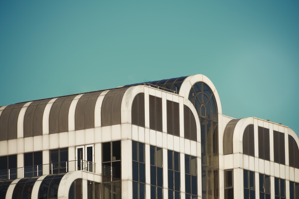 a tall building with lots of windows on top of it