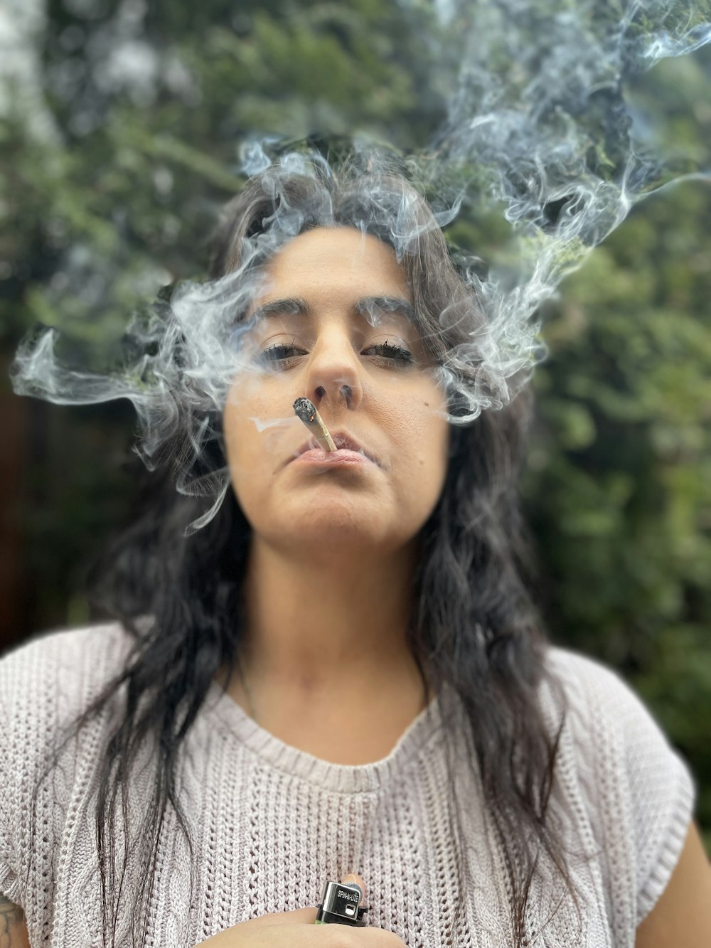 a woman with smoke coming out of her head