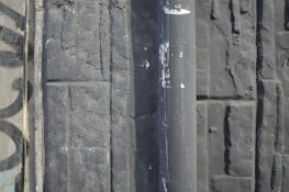 Before and after images showing a pipe restored flawlessly without any wall damage.