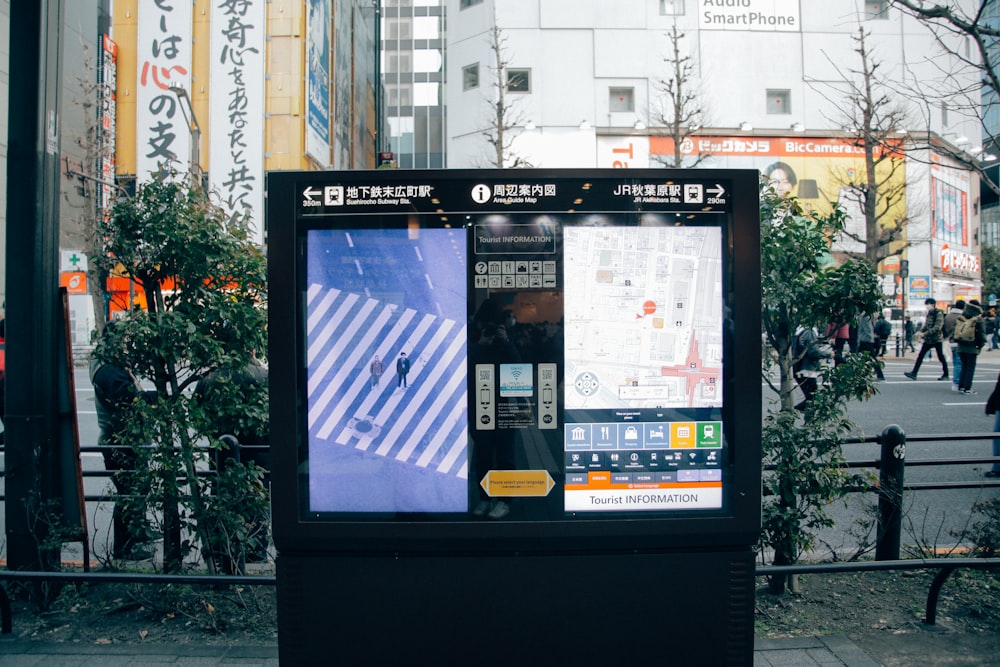 a public phone booth on a city street