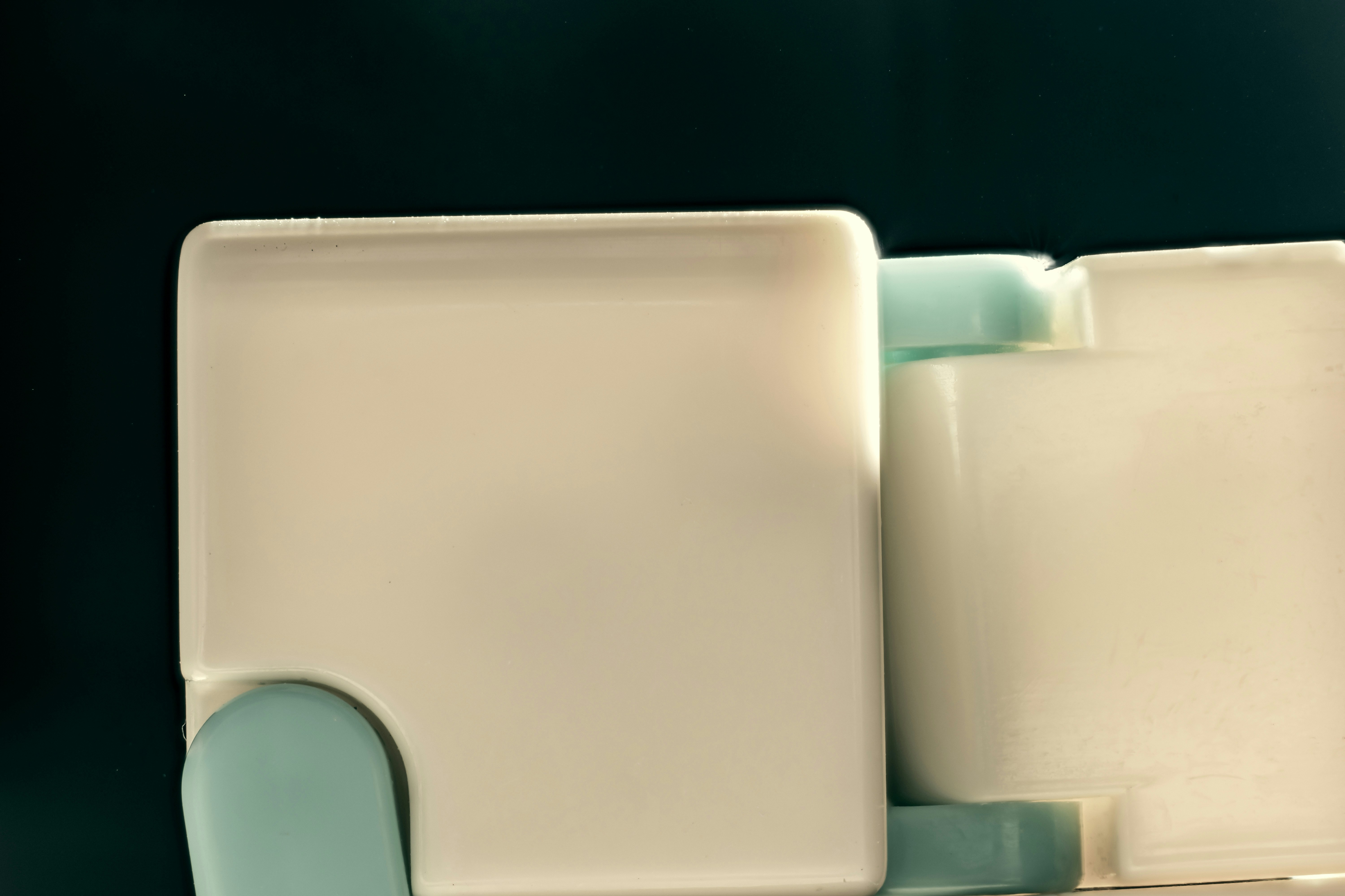 Closeup macro shot of a plastic toy in dark background