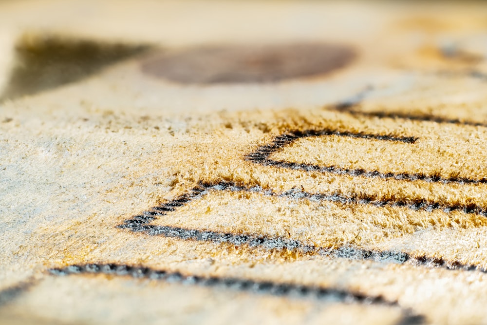 a close up of a rug with a design on it