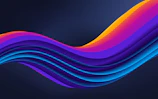 Colorful soundwave graphic flowing across a dark background.