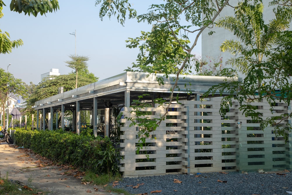 a building that has a bunch of plants growing on it