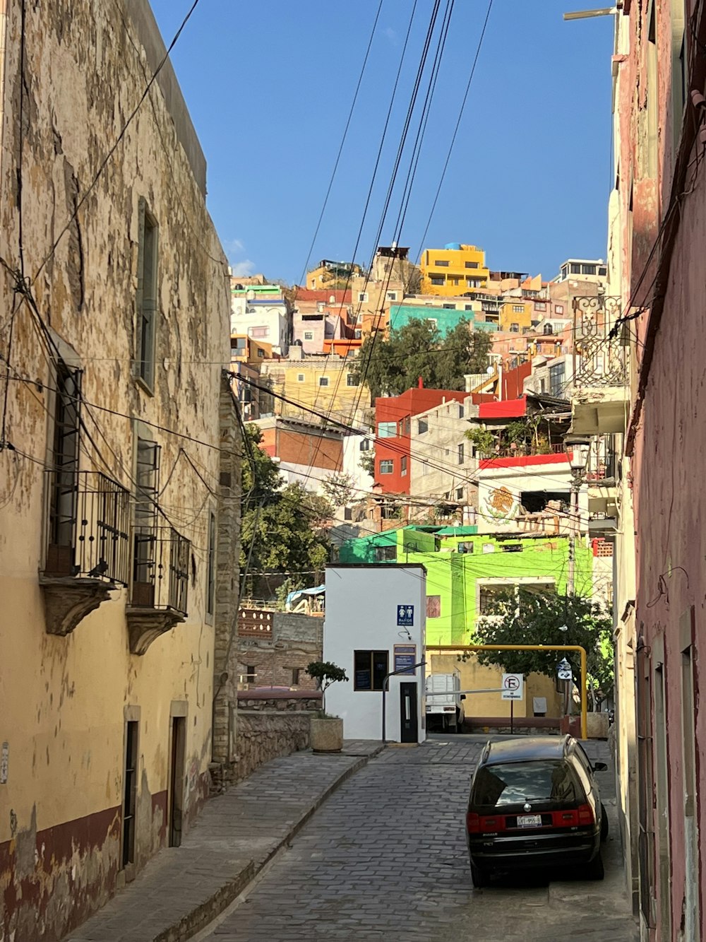 a car parked on the side of a street