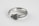 A silver ring designed to resemble a snake with intricate scale details. The inside of the band is engraved with text, including 'COPPERTIST.WU' and 'S925'. The image captures the ring on a plain white background, emphasizing the craftsmanship and texture of the metalwork.
