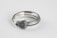 A silver ring designed to resemble a snake with intricate scale details. The inside of the band is engraved with text, including 'COPPERTIST.WU' and 'S925'. The image captures the ring on a plain white background, emphasizing the craftsmanship and texture of the metalwork.
