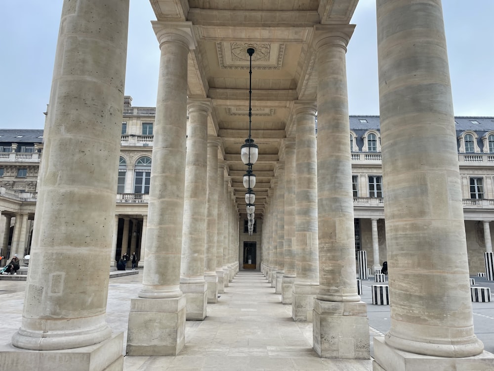 a row of pillars in front of a building