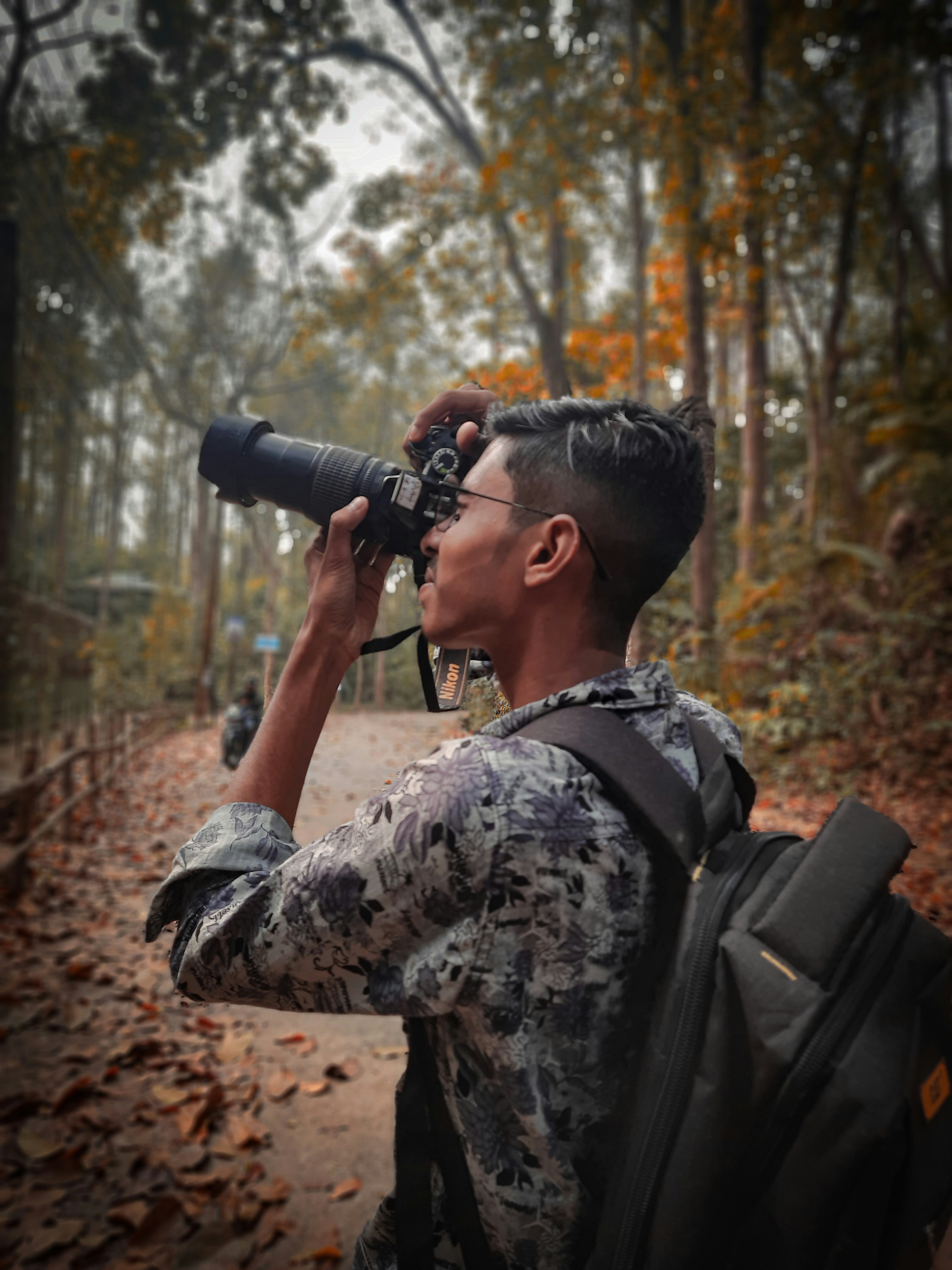 a man taking a picture with a camera