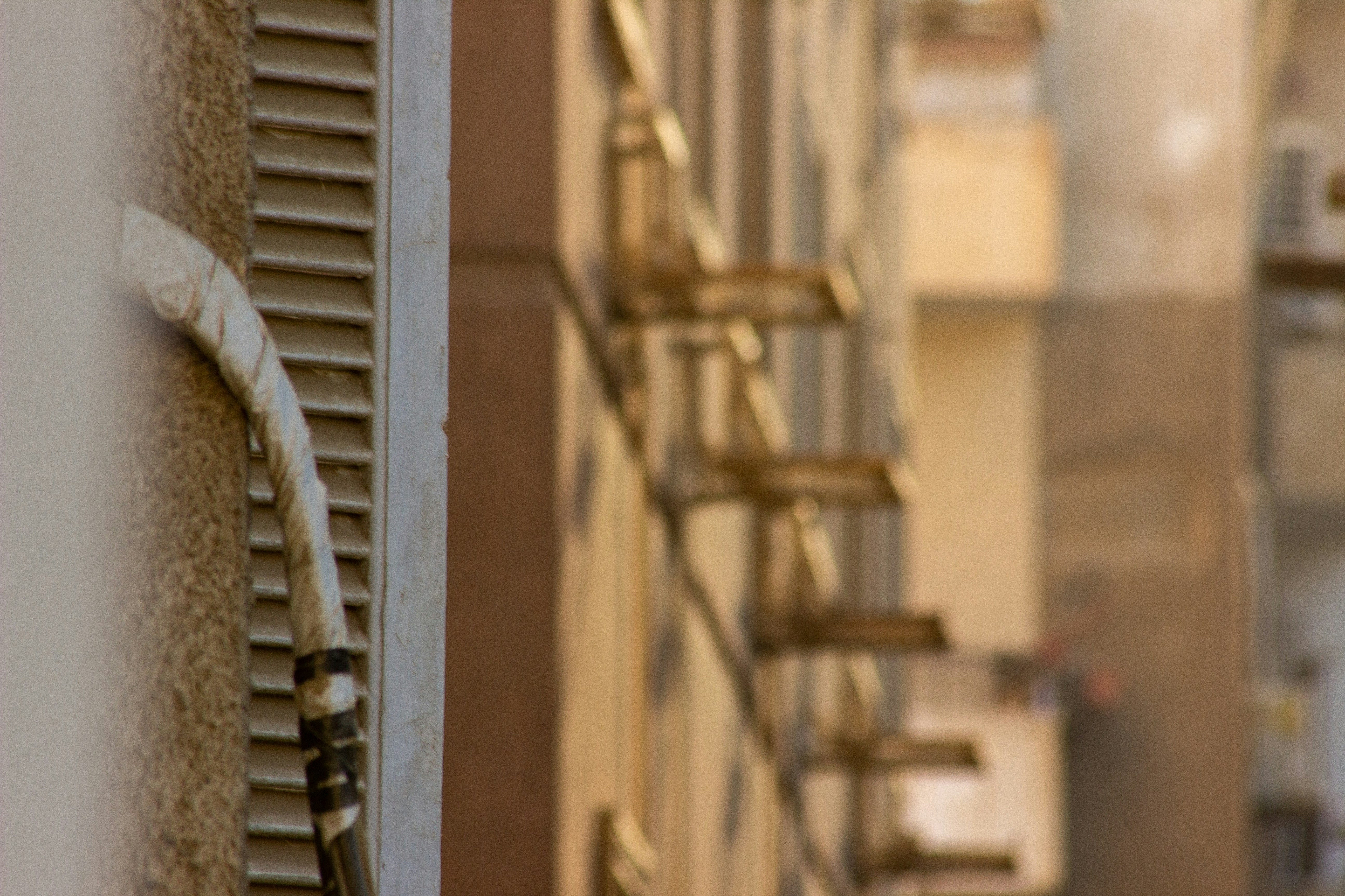 a close up of a clock on the side of a building