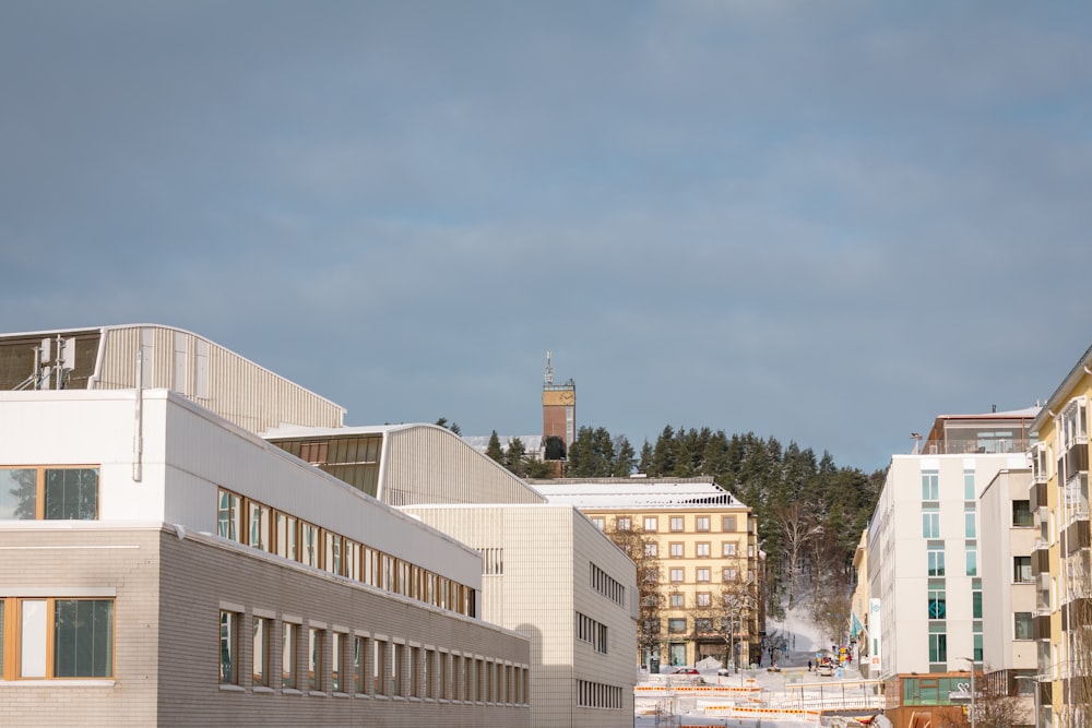 a view of a building with a clock tower in the background