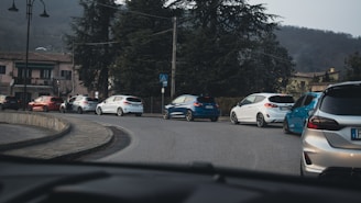 a group of cars parked on the side of a road