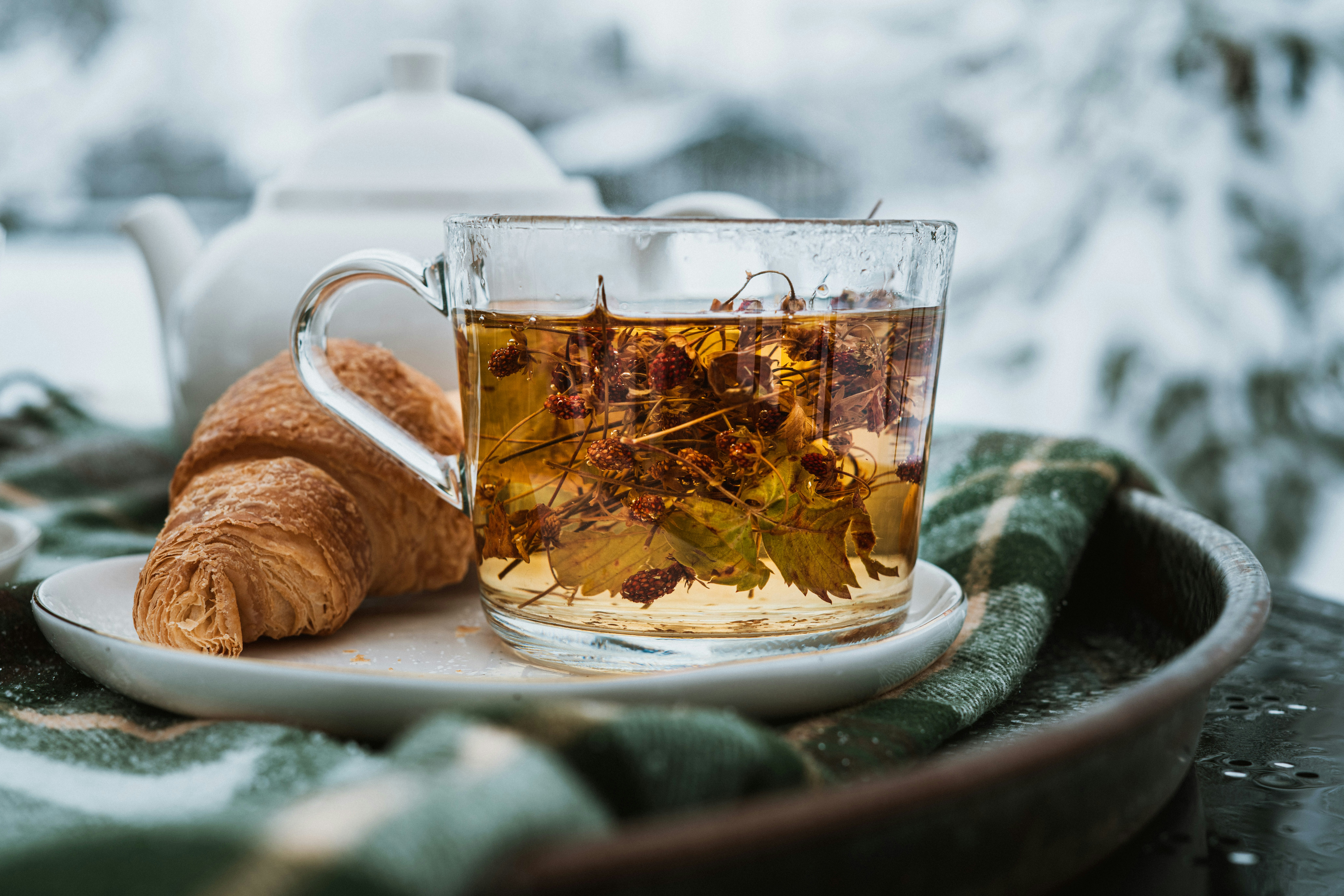 Croissant with a glass of tea