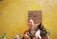 A happy customer with their pet receiving delivery from 724mama.