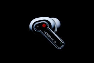 a pair of ear buds sitting on top of each other