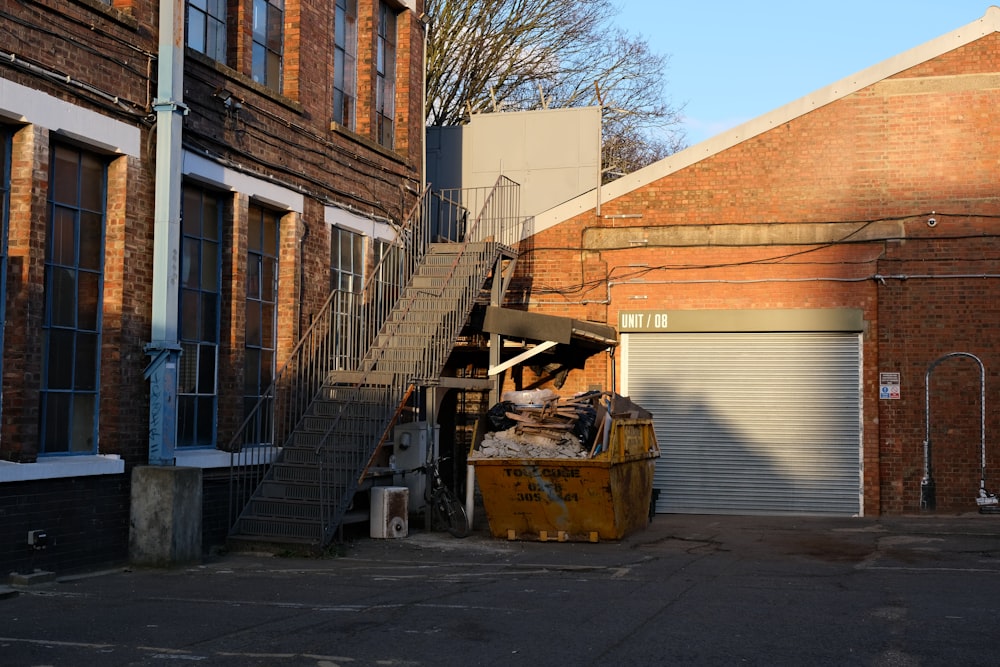 a fire escape next to a building with a staircase