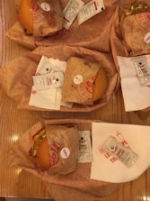 Stack of packaged hickory smoked burgers ready for shipment.