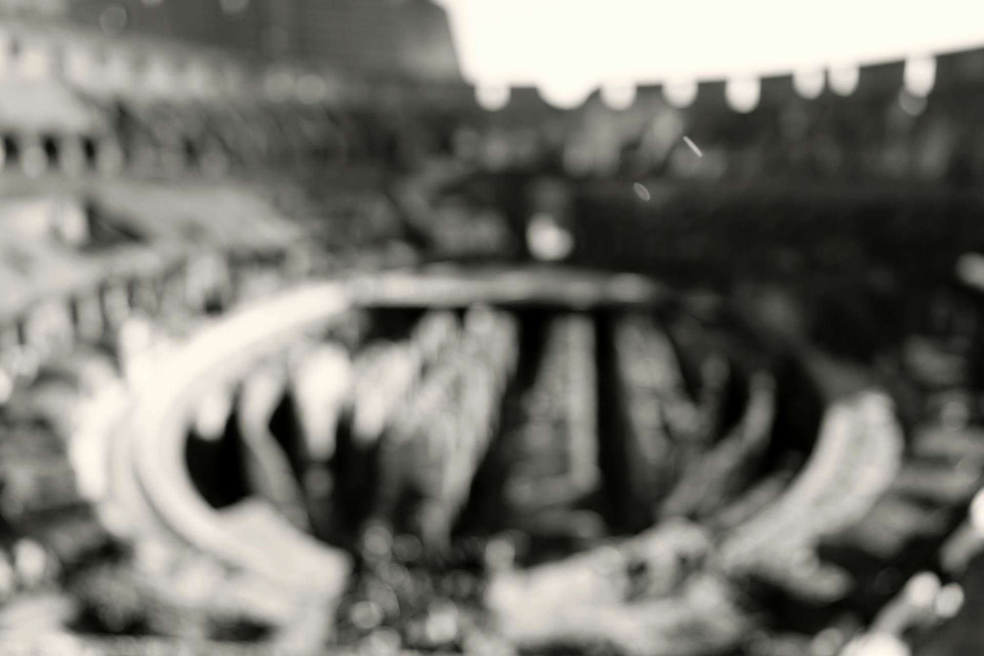 a black and white photo of a bunch of chairs
