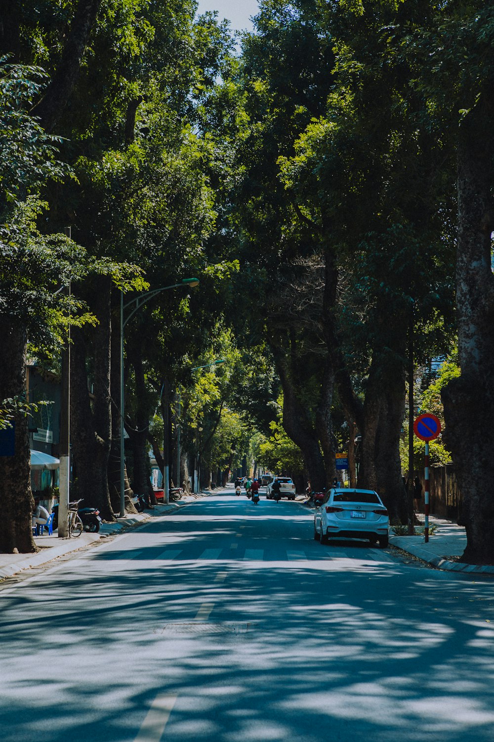 a car is parked on the side of the road