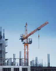 a crane that is on top of a building