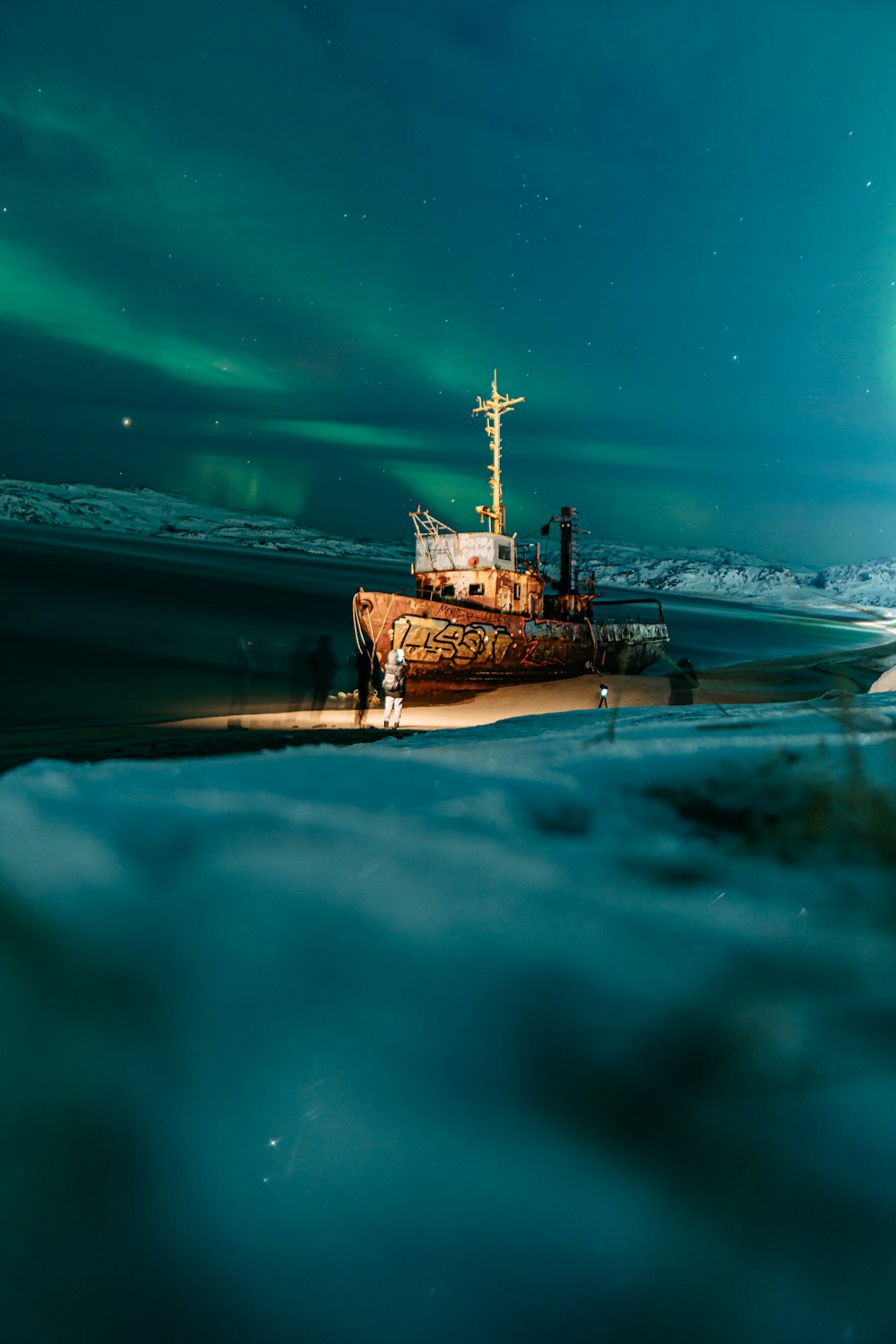 a boat floating on top of a body of water