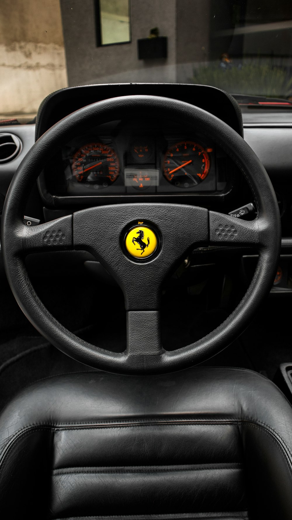 a steering wheel and dashboard of a car