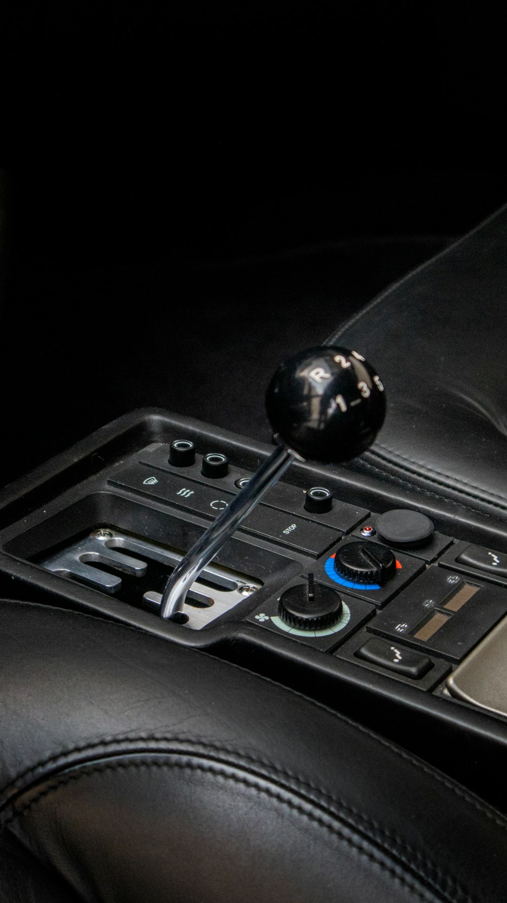 a close up of a control panel in a car