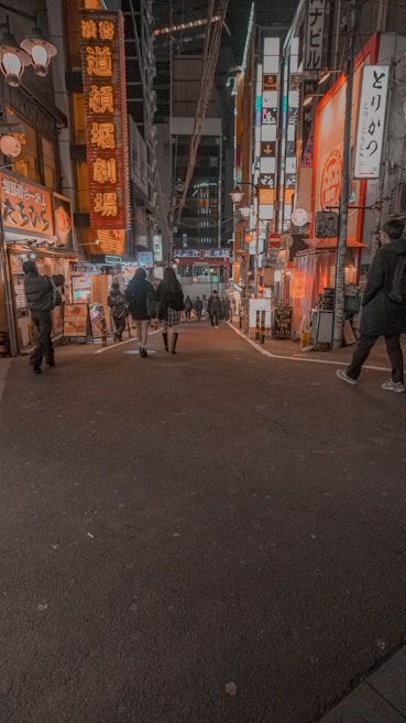 Vibrant neon-lit alleys of Tokyo bustling with night market energy