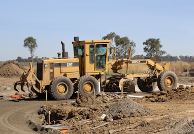 a bulldozer is parked on a construction site