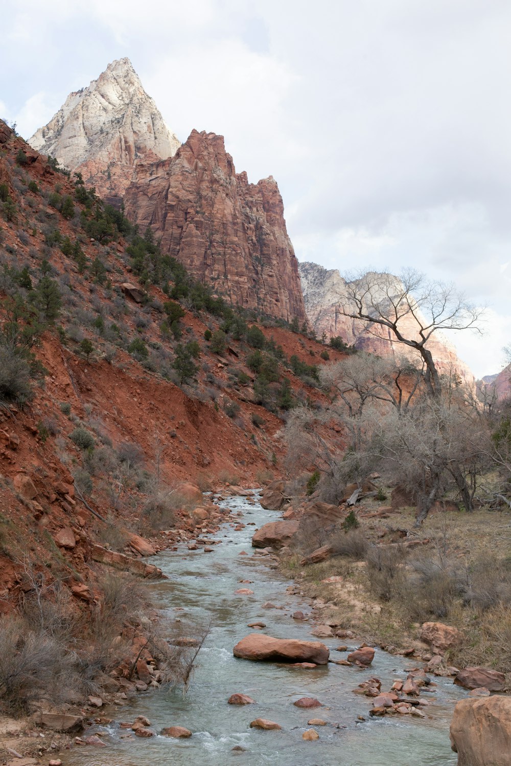 a river running through a rocky mountain valley