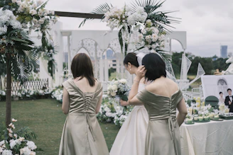 Wedding planner calmly coordinating vendors during an outdoor wedding in Malaga.