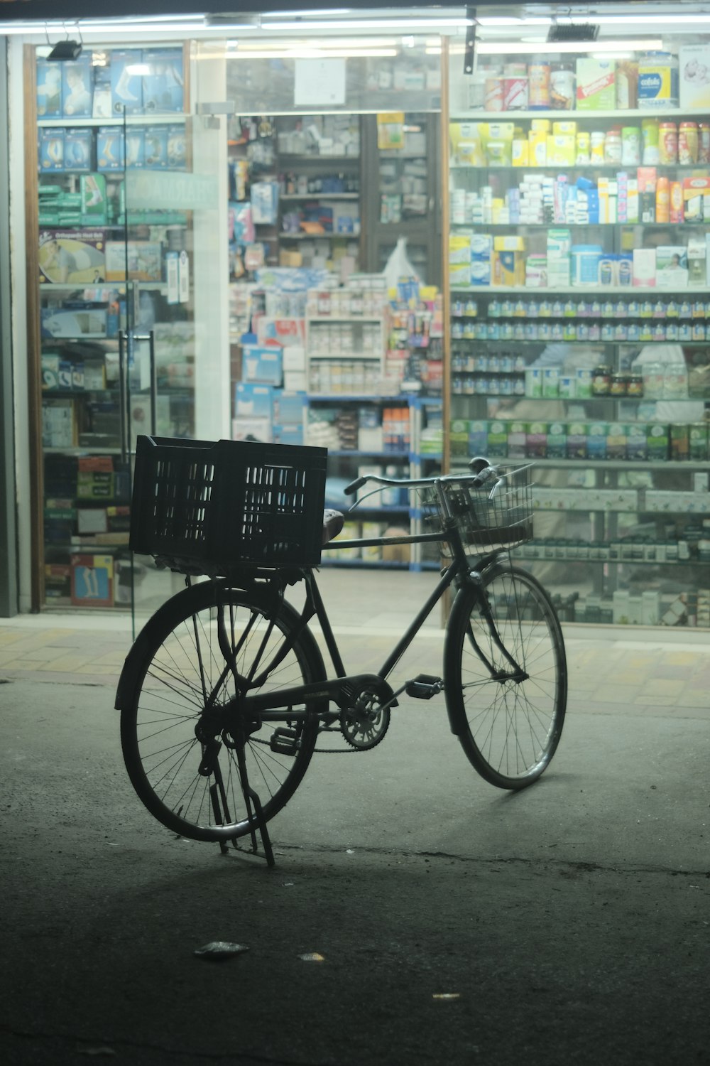 a bicycle parked in front of a store