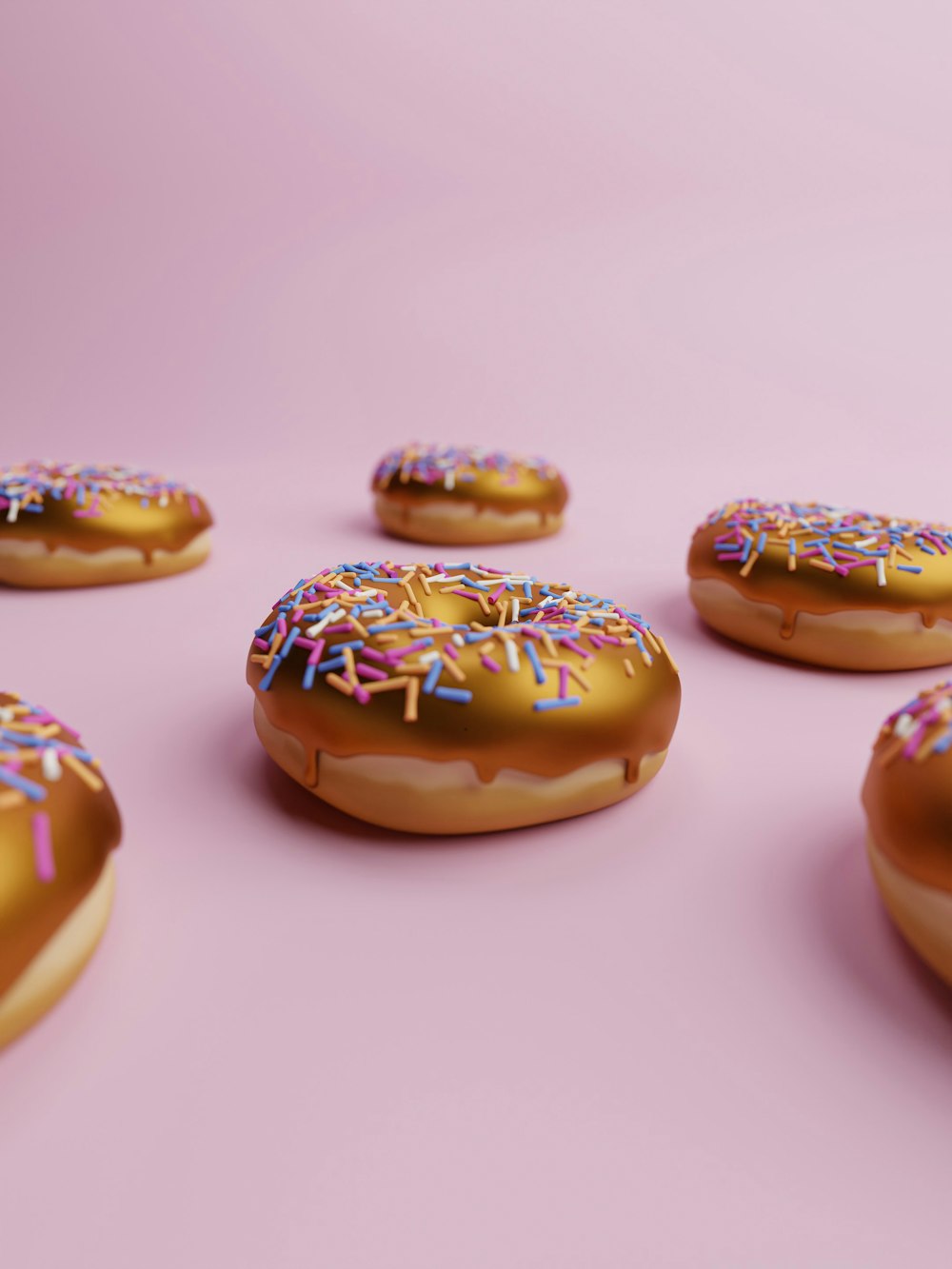 a group of donuts with sprinkles on them