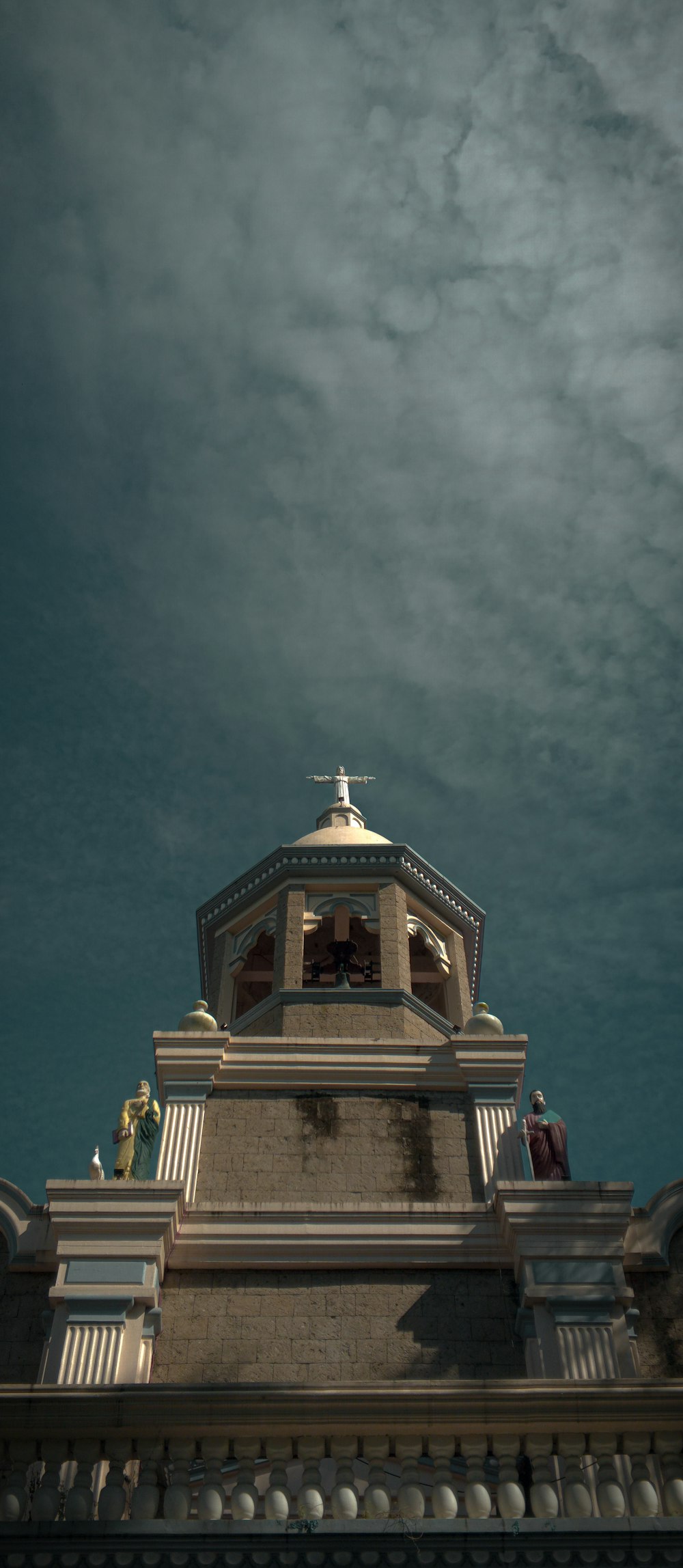 a clock tower with a sky background