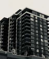 A modern residential condominium building with connected internet devices visible.