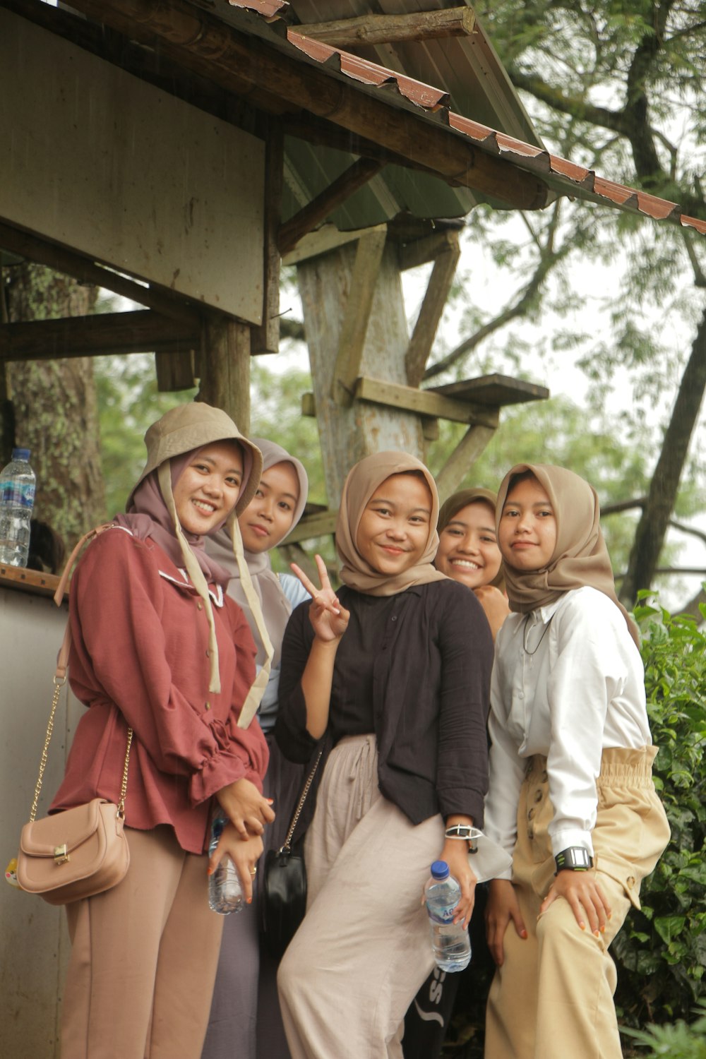 a group of women standing next to each other