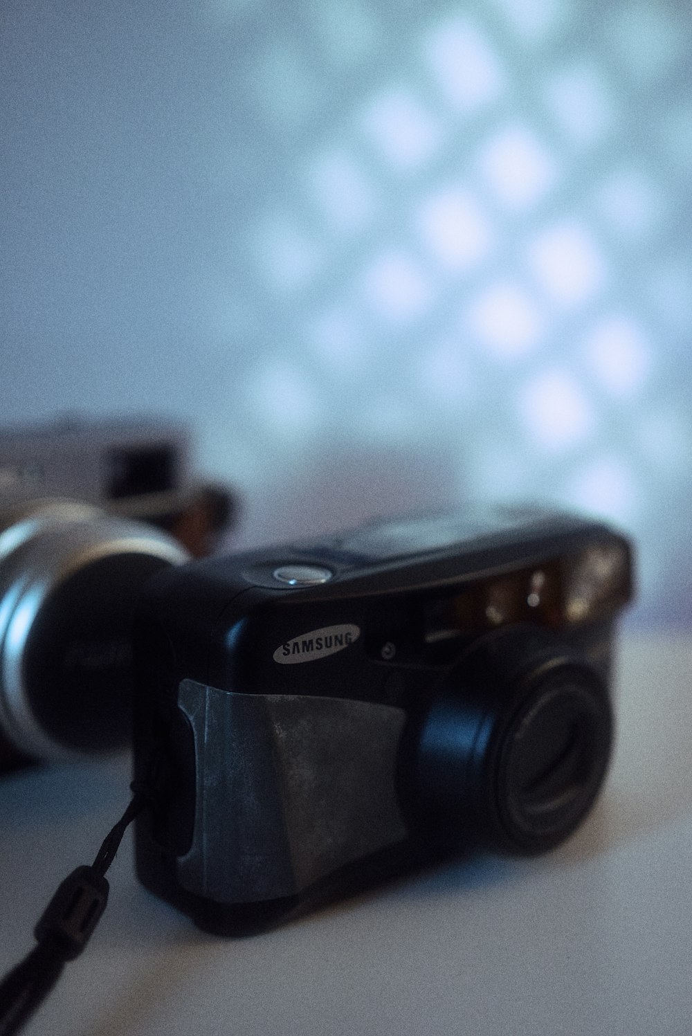 a close up of a camera on a table