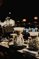 An artisan coffee brewing setup with various tools.