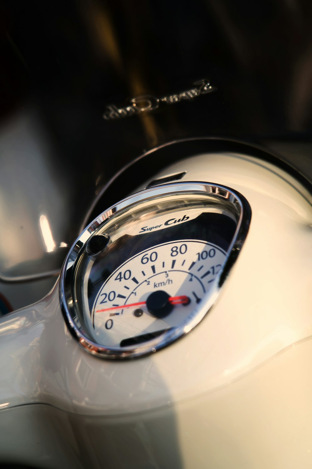 a close up of a speedometer on a motorcycle