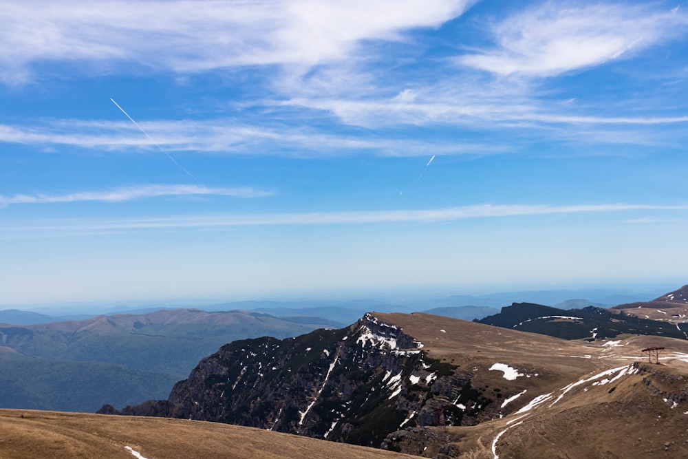 a person standing on top of a mountain