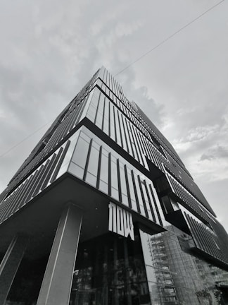 a black and white photo of a tall building