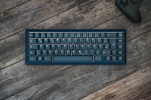 A dynamic controller and keyboard combo illustrating gaming and software