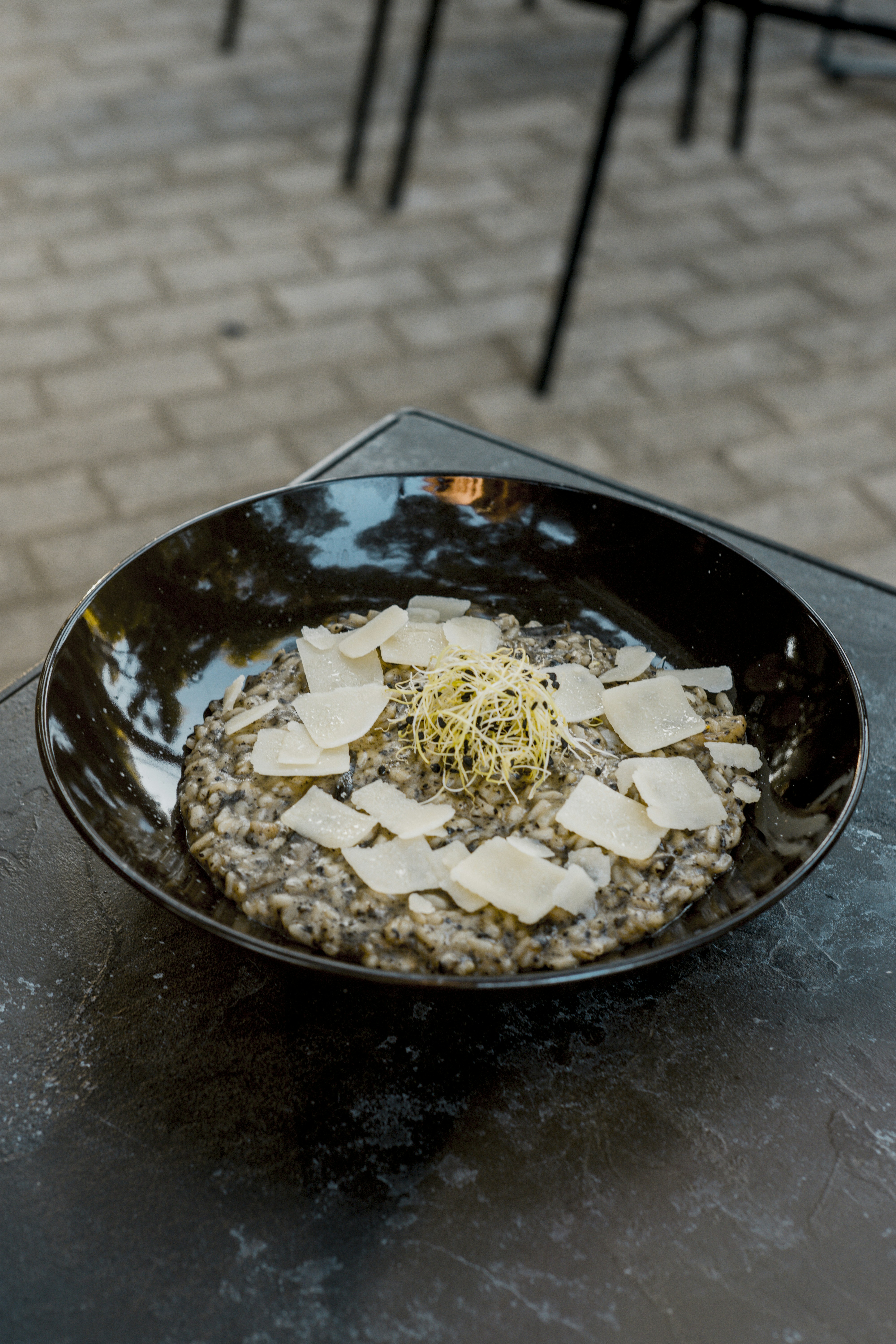 a bowl of food on a table outside