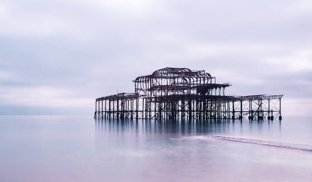 a large structure sitting in the middle of a body of water