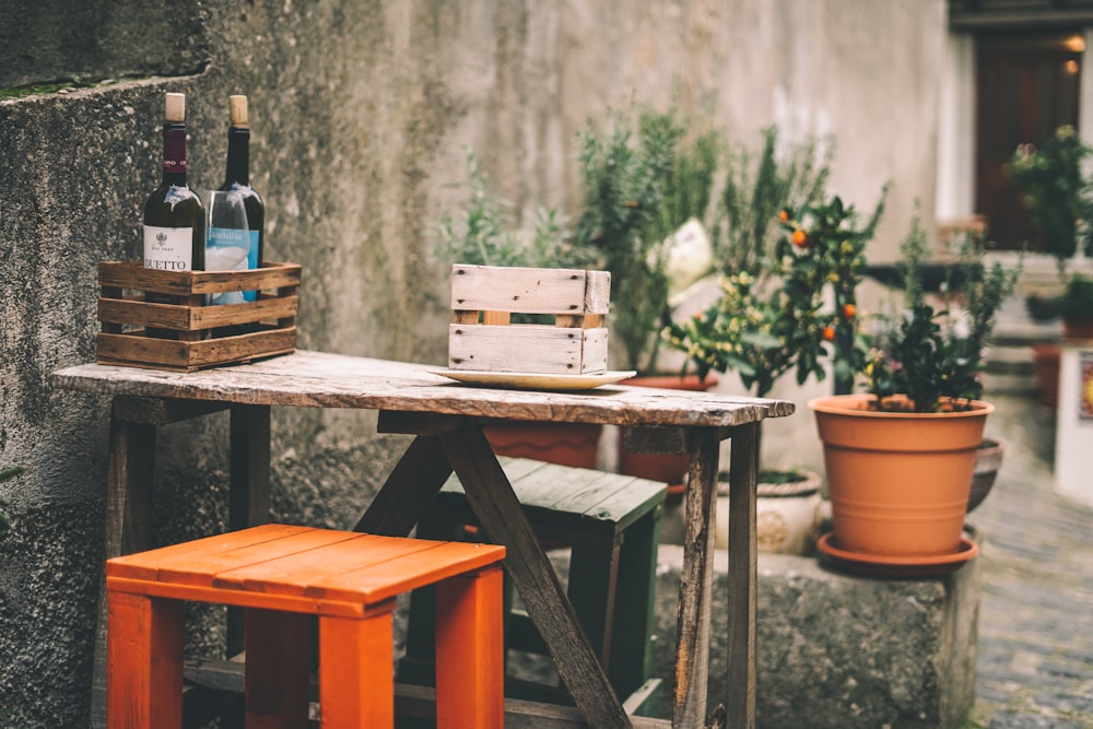 a table with a bottle of wine on top of it