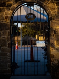 a gate that has a sign on it