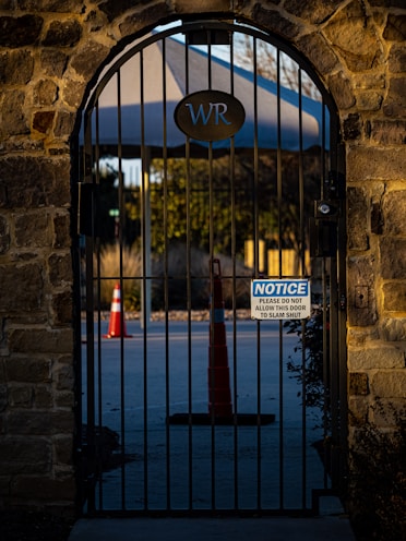 a gate that has a sign on it