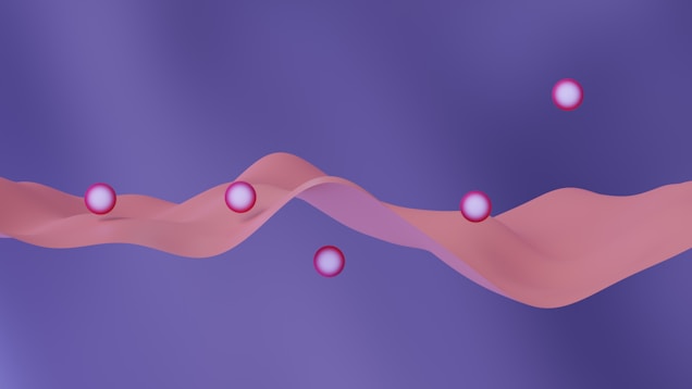 A flowing pink ribbon-like structure waves horizontally across a blue-purple gradient background. Several pink spheres are scattered along the ribbon, adding a sense of movement and balance to the composition.