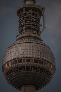 Engineers inspecting the intricate framework inside a dome ship's hull.